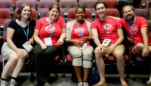 The WordCamp Montreal 2015 Organizers all sitting together in the first row of an auditorium